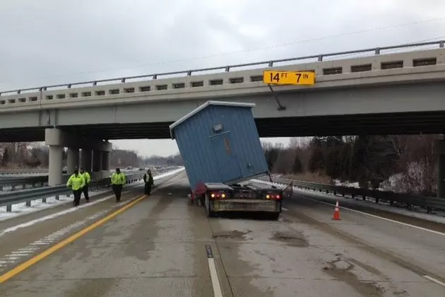 Semi With Tall Load Smashes into Overpass in Southeast Michigan