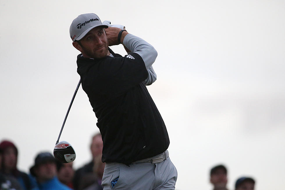 Dustin Johnson Leads Weather-Delayed Open Championship