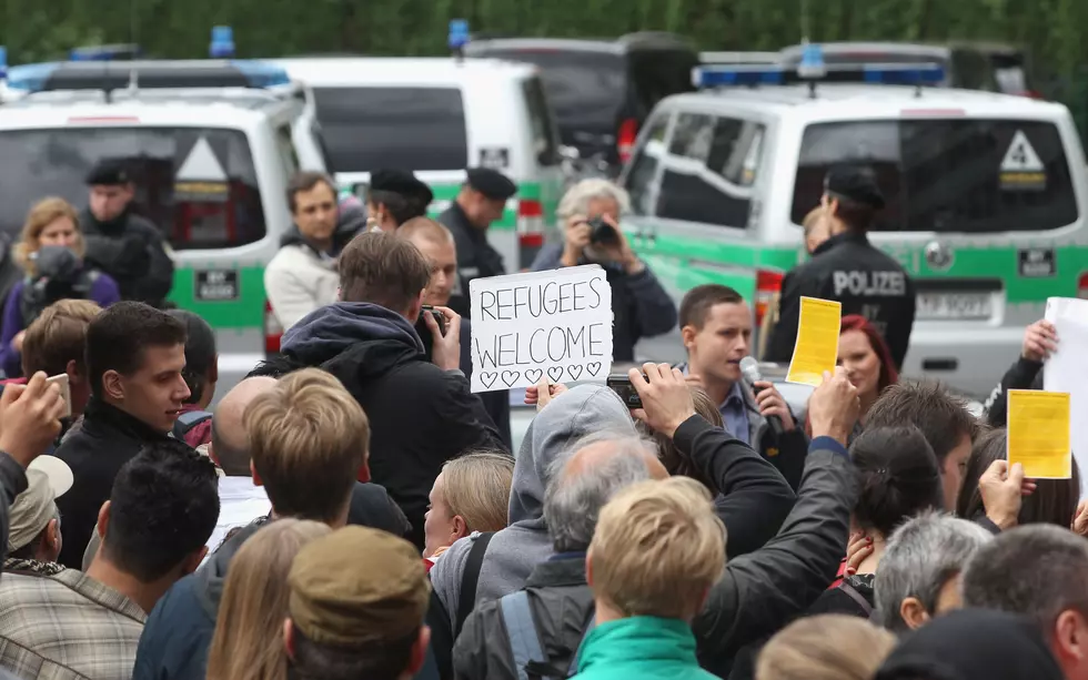 Thousands Of Refugees Arrive In Germany