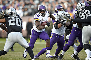 Peterson Helps Vikings Run Past Raiders 30-14