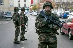 French Authorities Raid Paris Apartment