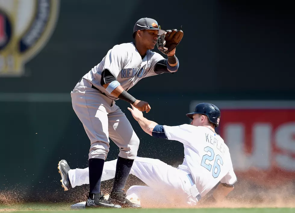 Santana Pitches Into 8th as Twins Beat Yankees 7-4