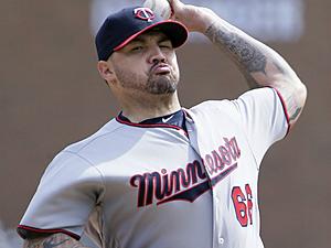 Twins Earn Split of Series With Tigers