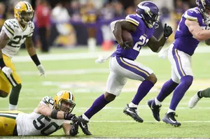 Rodgers Injured in Vikings Win Over Packers