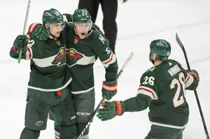 Wild Blow Big Lead but Win in Overtime