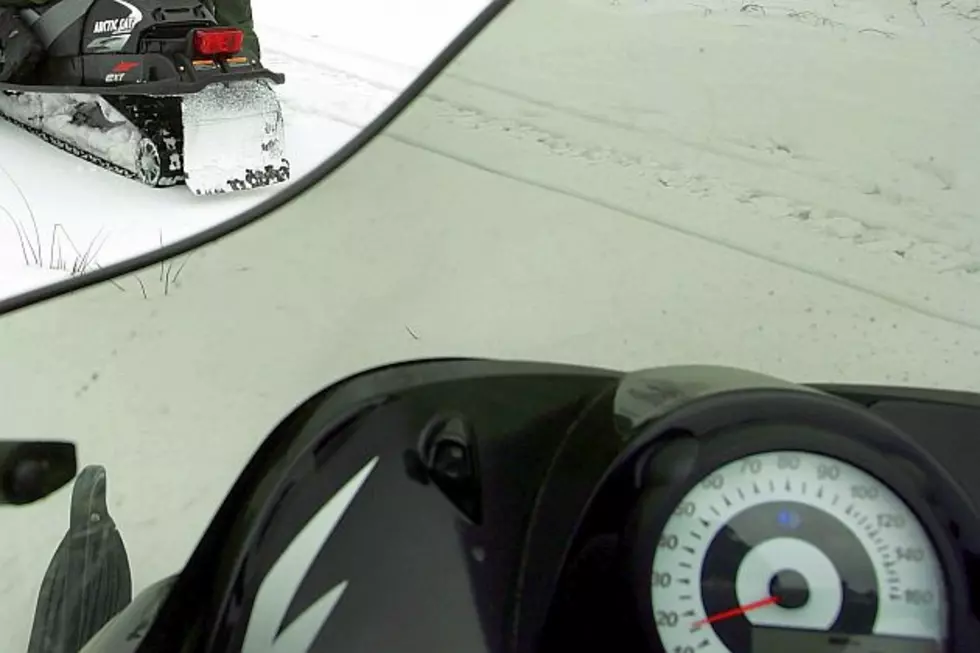Snowmobile Rider Suffers Minor Injuries in Crash
