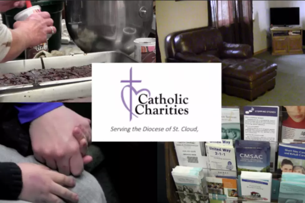 Behind Catholic Charities 
