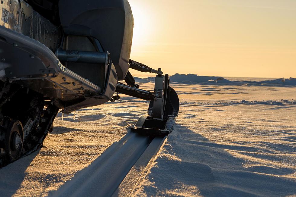 Snowmobile Breaks Through Ice on Lake Koronis