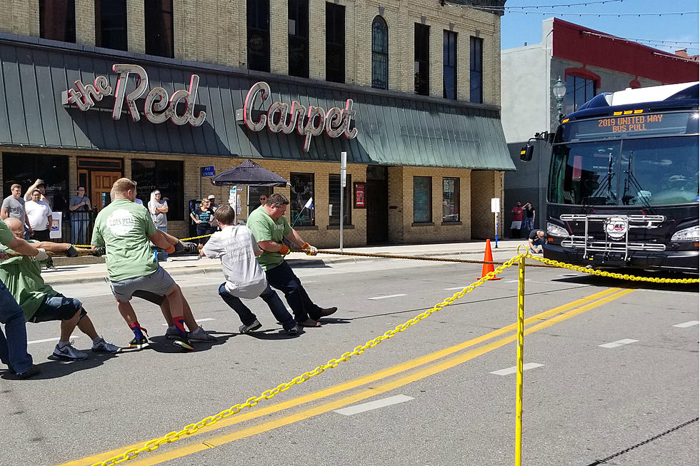 3rd Annual Community Bus Pull Takes Over 5th Ave [VIDEO]