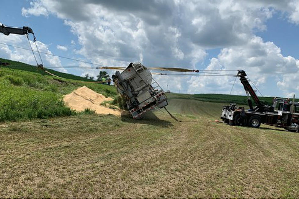 Semi-Truck Pulling Feed Trailer Rolls Into Ditch