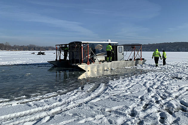 Towed Fish House Breaks Through Ice on Big Watab Lake