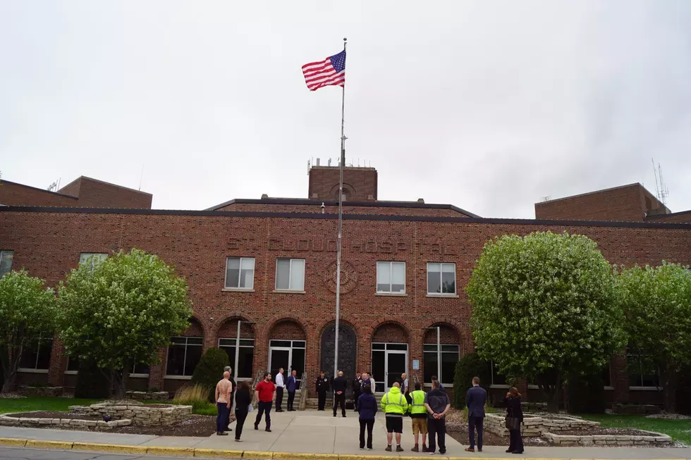 CentraCare Holds Flag Raising Ceremony In Honor of Memorial Day
