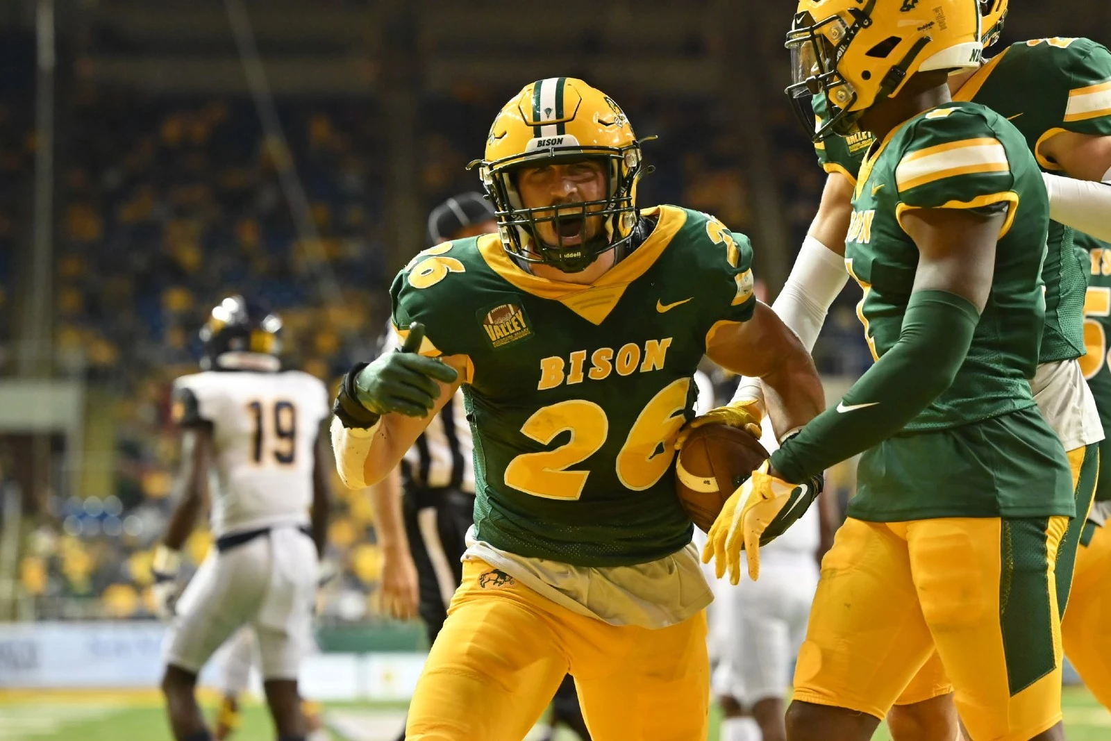 Bison football team visits the end zone often in Eau Claire, Sports