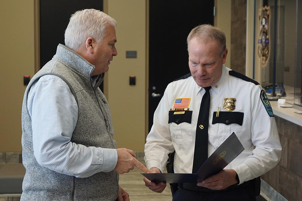 Congressman Emmer Presents Congressional Record to Chief Hughes