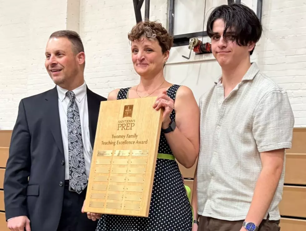 Chad Spahn, Sarah Pasela, Ben Spahn, PHOTO courtesy of St. John's Prep.