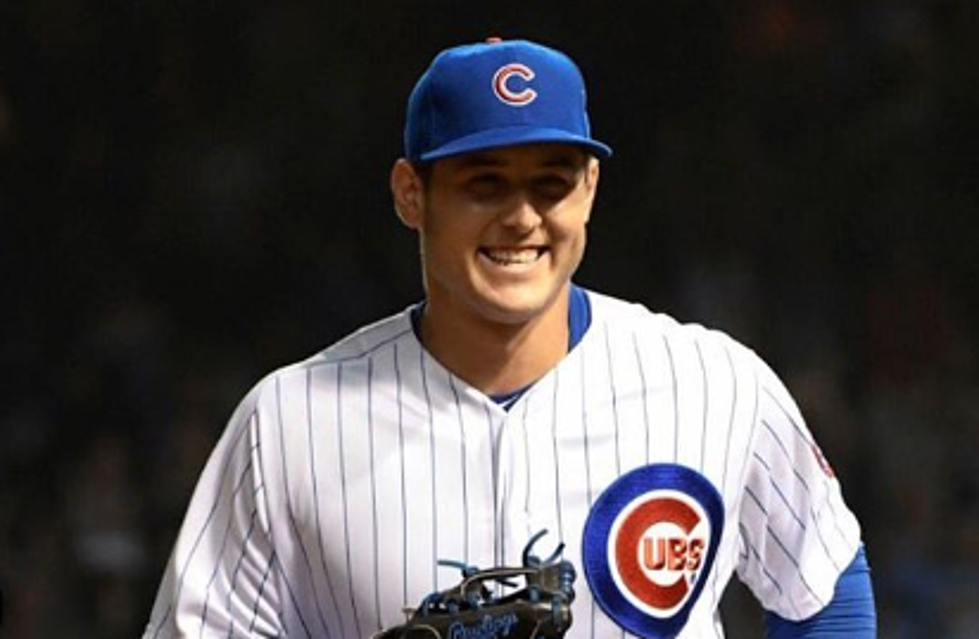 A Cubs Anthony Rizzo jersey hangs near the Yankees dugout in the