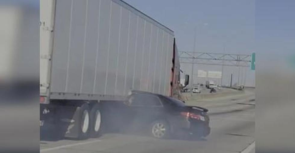 Watch: Car With Driver Inside Gets Dragged Down I-294 By A Semi