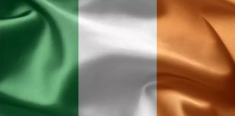 Waterloo Building Owner Flies Irish Flags with U.S. Flag