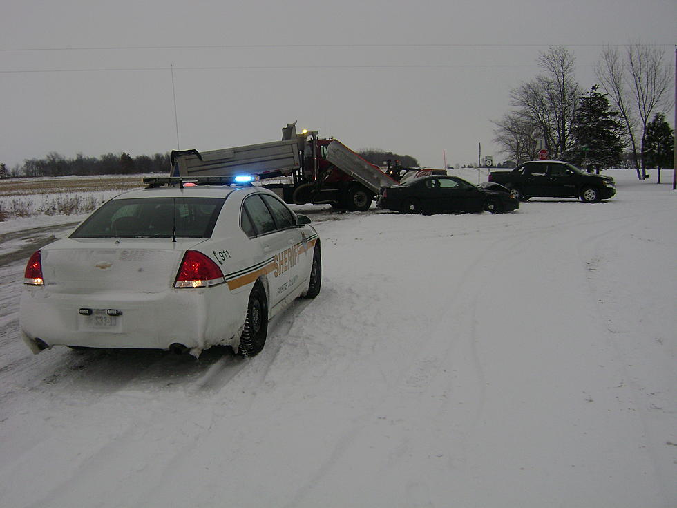 Woman’s Car Collides with County Snow Plow Truck