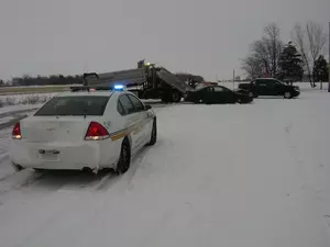 Woman&#8217;s Car Collides with County Snow Plow Truck