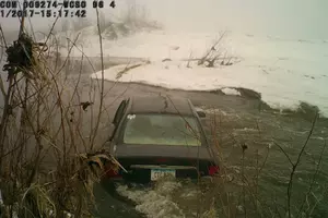 Fog Causes Motorist to Miss Stop Sign, Go into Creek