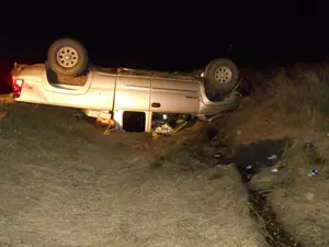 Pickup Driver Charged with Causing Rollover