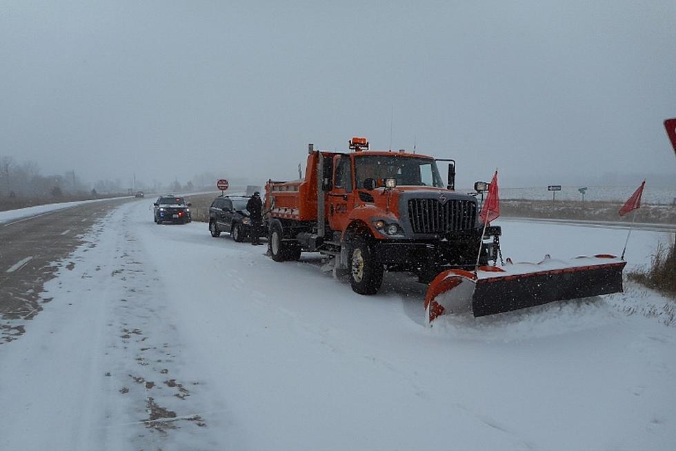 Snowplow Gets Hit by Passing Vehicle, Goes Over Cliff [VIDEO]