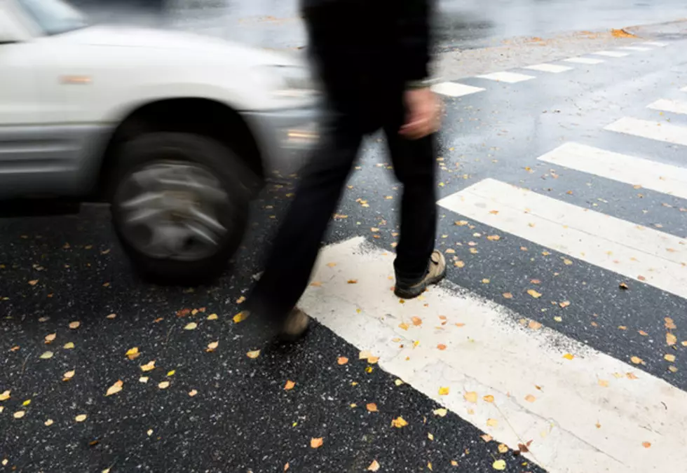 Pedestrian Walks in Front of Semi on Eastern Iowa Highway