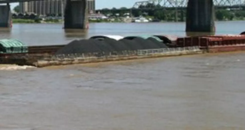 High Winds Pull Barges Down River in PDC