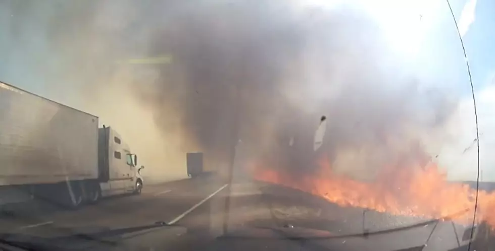Fast-Moving Grassfire Along I-80 Nearly Swallows Cop Car [WATCH]