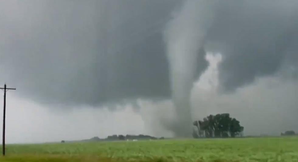 Dust whirlwind twister during summer drought on farm