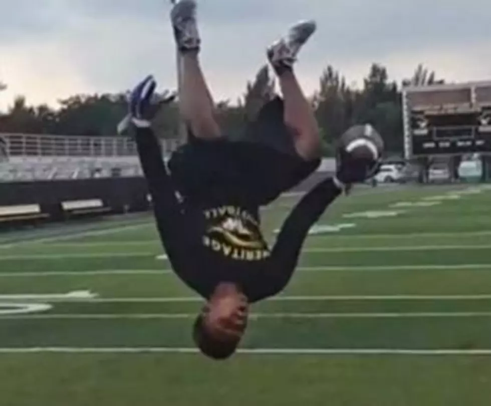 The Amazing One-Handed Backflip Football Catch (Video)