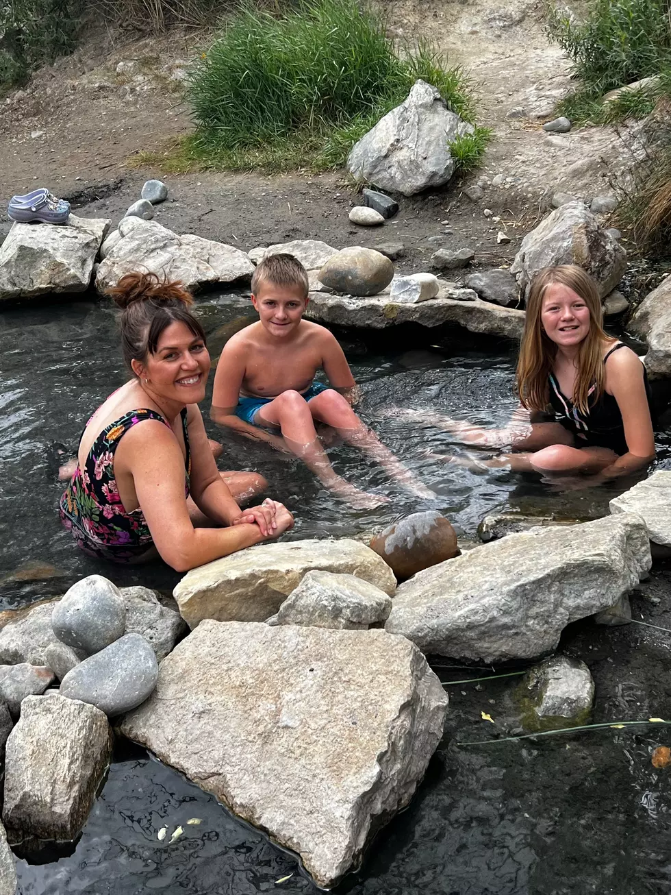 Credit: Tom Drake | My wife Ashley (left), son Bennett (middle), and daughter Sawyer (right) enjoying the thermal seeps on the banks of the North Platte River.