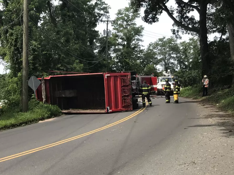 Dump Truck Rolls Over, Tears Down Power Lines in Danbury