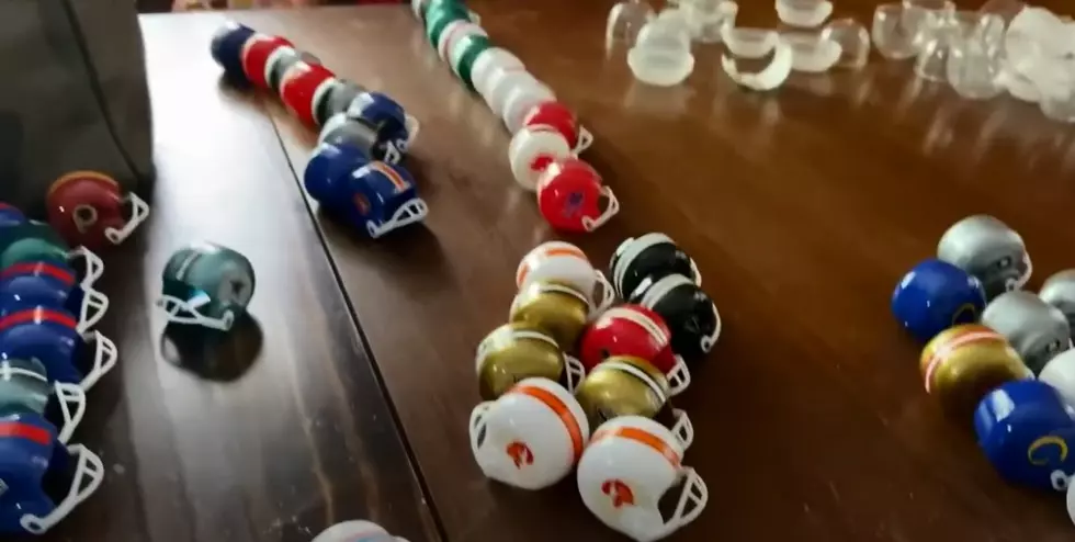 See Lou Milano’s Impressive Mini NFL Helmet Collection