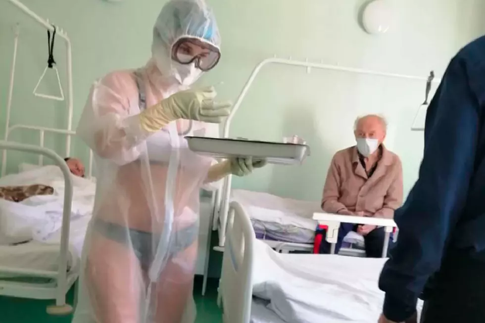 Sexy Nurse In Trouble for See Through PPE Gown With Only Bra And