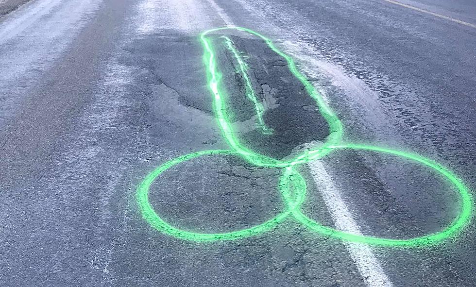 Man Spray Paints Phallus on Pothole to Get It Fixed Faster