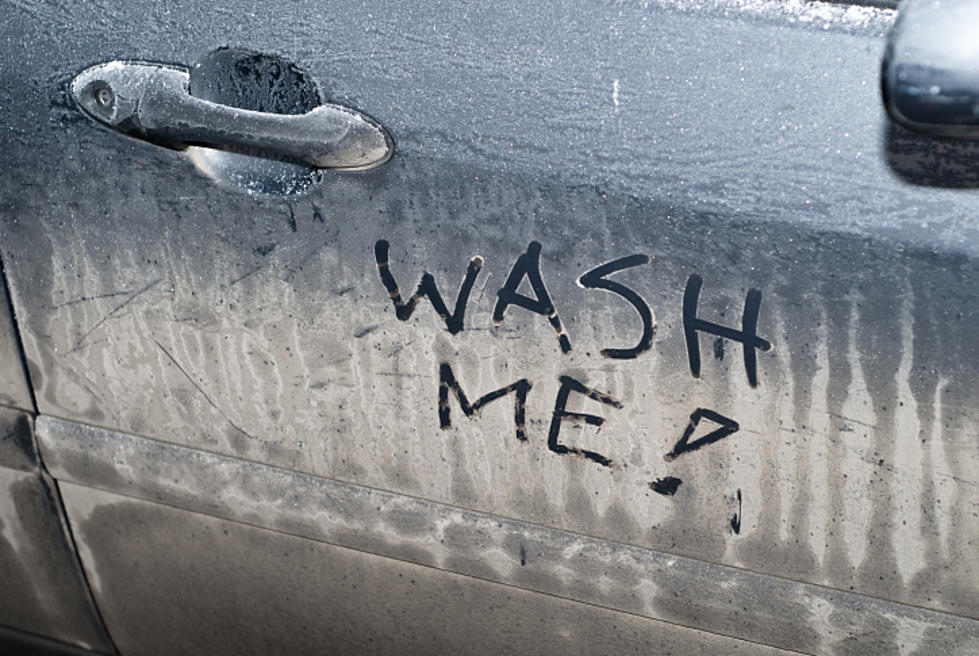 Intricate Batman Artwork Etched in Dirty SUV Window in Danbury