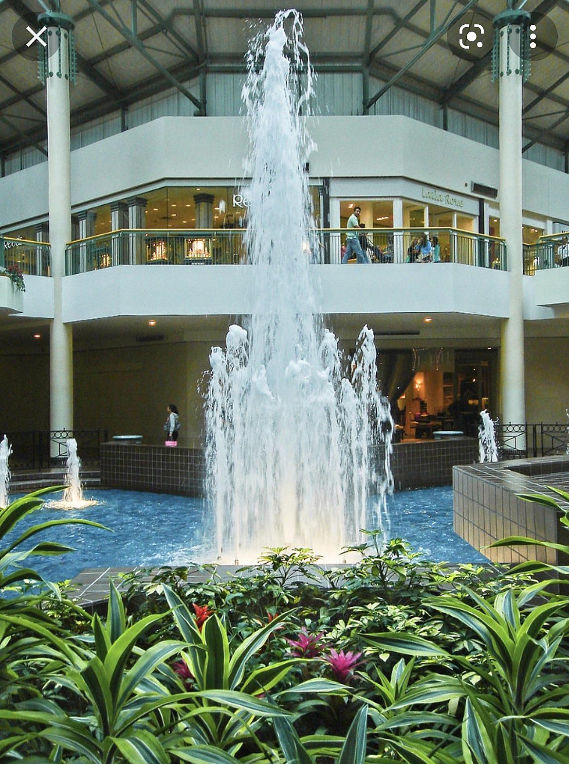 Old fountains and aquariums at Woodfield Mall.