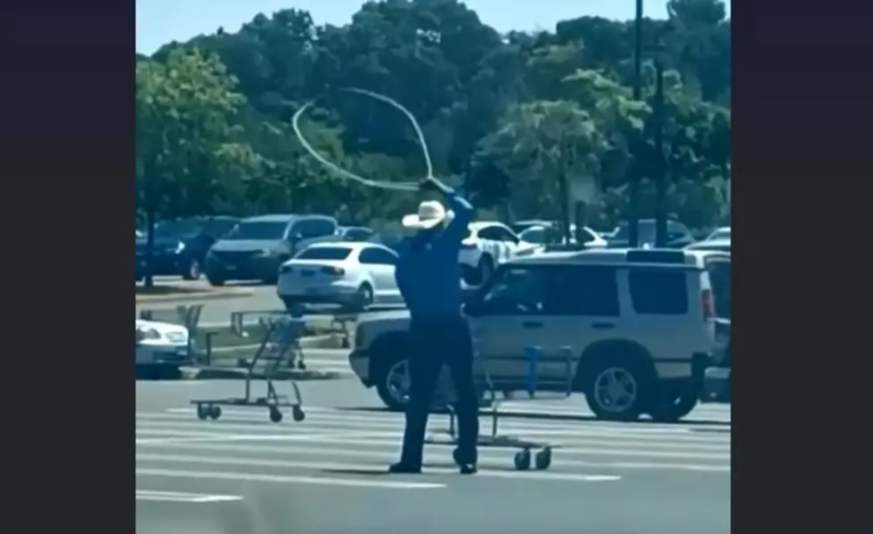 Milford Cowboy Lassos Shopping Carts in Wal-Mart Parking Lot