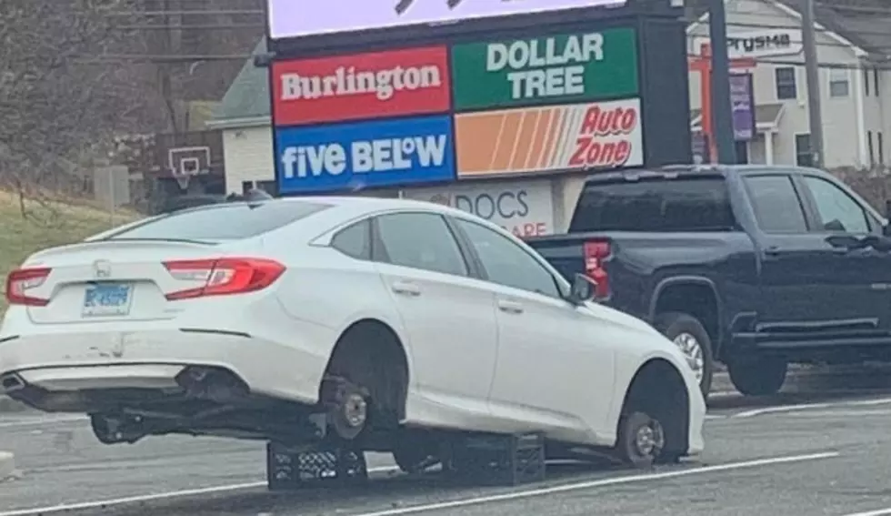 Jacked Up: Danbury Car Rests on Blocks in North Street Parking Lot