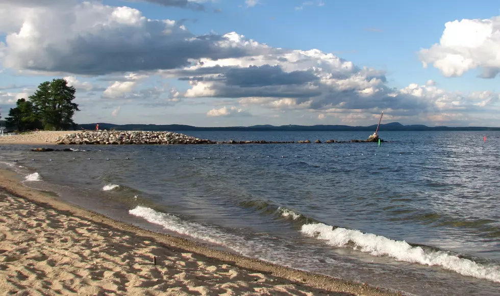 Heavy clouds over a beach at Lake Sebago, Maine