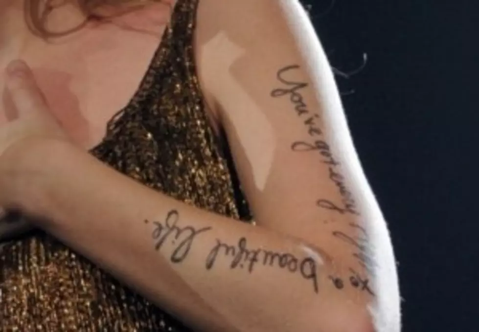 Taylor Swift Sharpies Herself With Song Lyrics