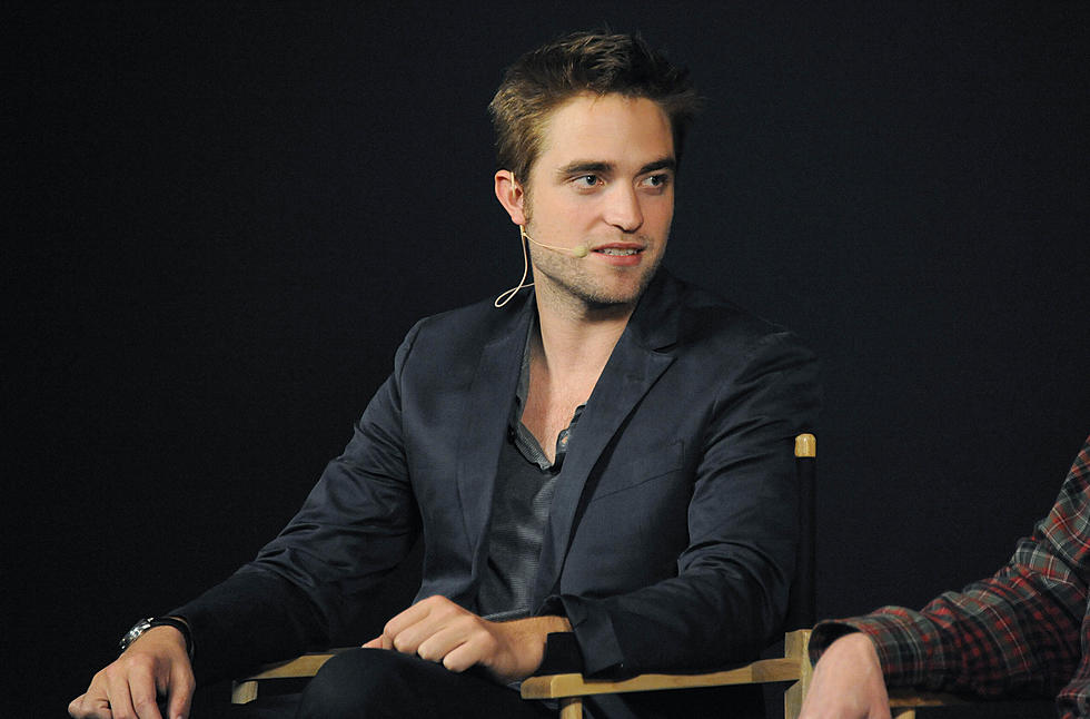 Robert Pattinson Gets Shut Out Of Party Van [VIDEO]