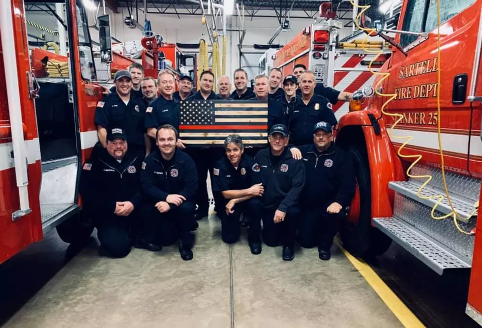 Kind Stranger Gifts Sartell Fire Department With Flag For New Station