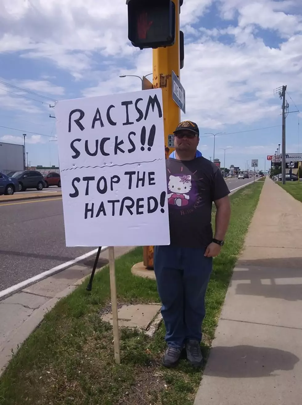 Man Holding &#8216;Racism Sucks&#8217; Sign In St. Cloud Goes Locally Viral