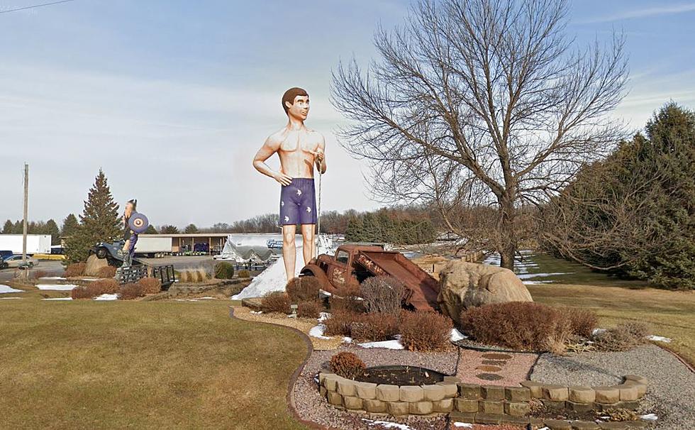 What Is This Thing? A Giant Shirtless Vikings Fan On The Side Of The Road?