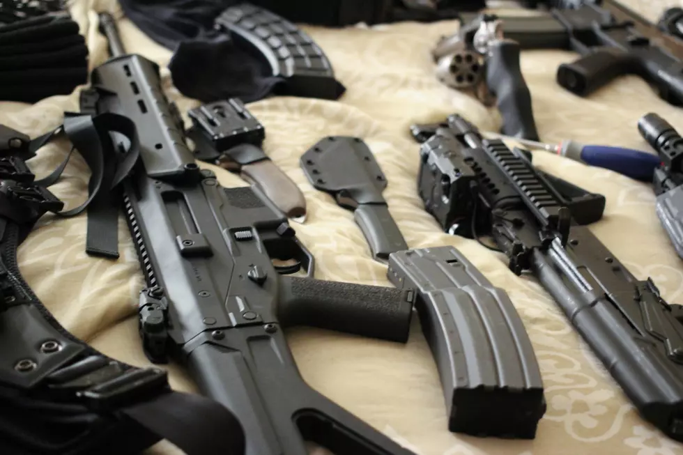 Bed Full of guns