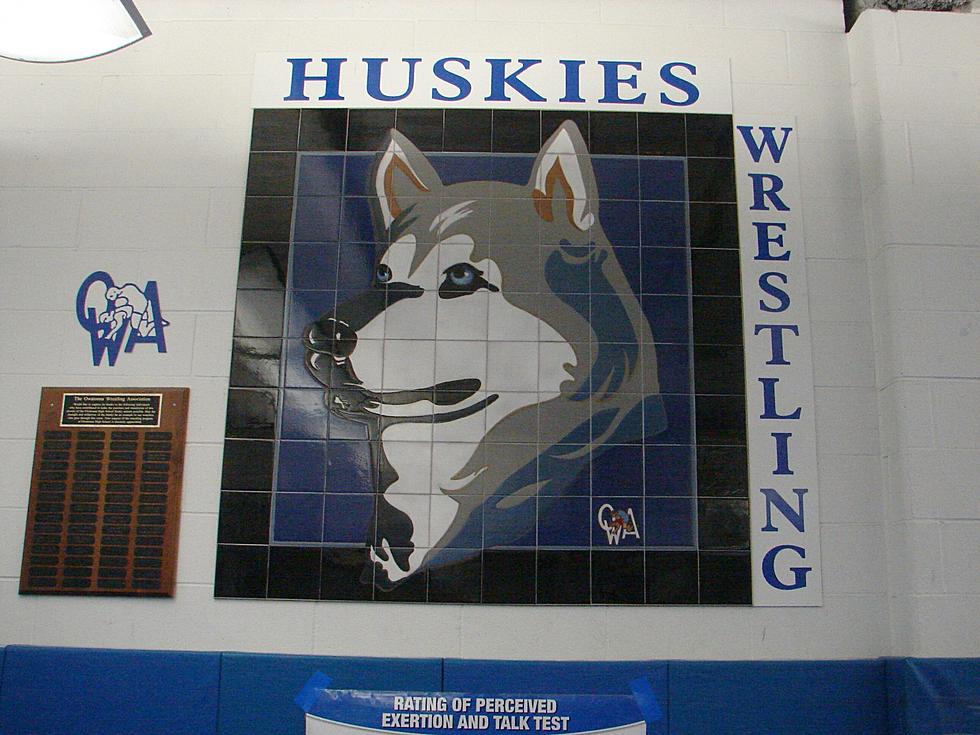 Huskies Wrestlers, Gymnasts Win Tournaments Saturday