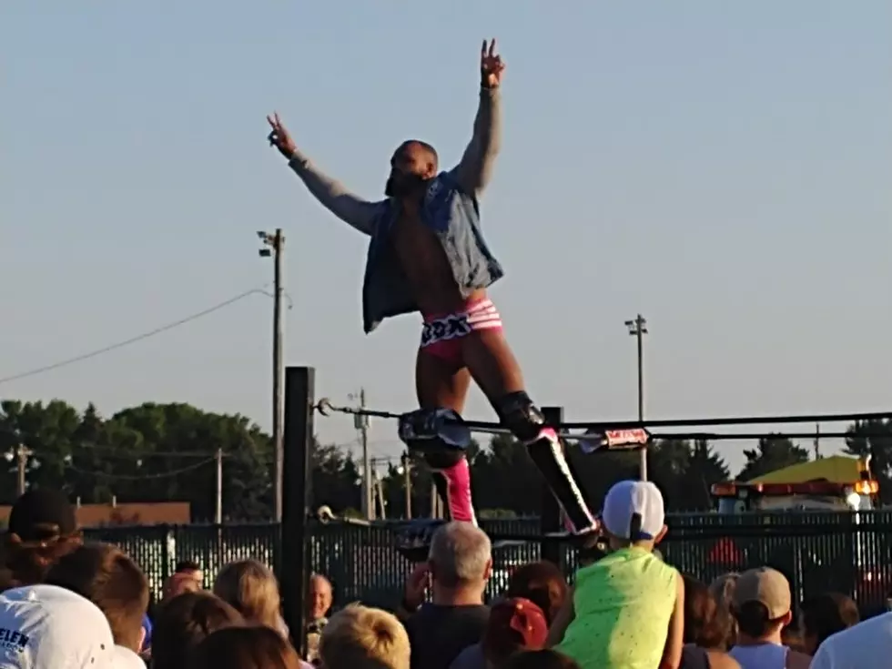 Turnbuckle-Shaking Good Time during All-Star Wrestling at Steele County Fair